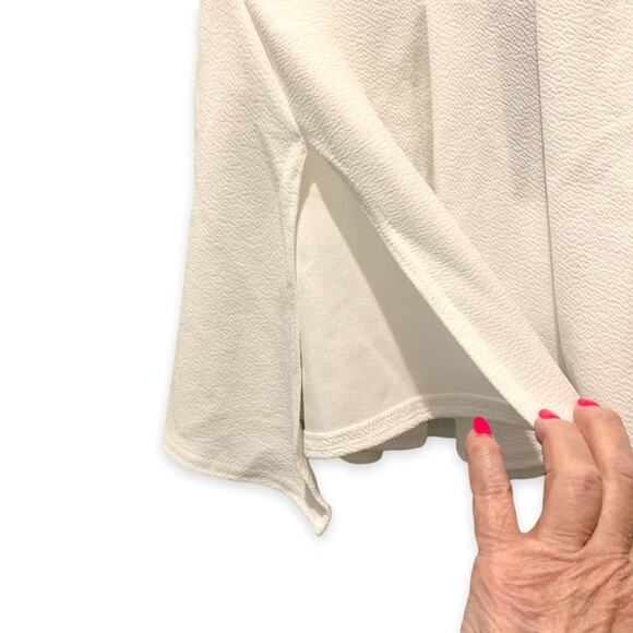 Pretty little thing white pleated mini side split tennis skirt. Size is US 4 - Picture 4 of 10